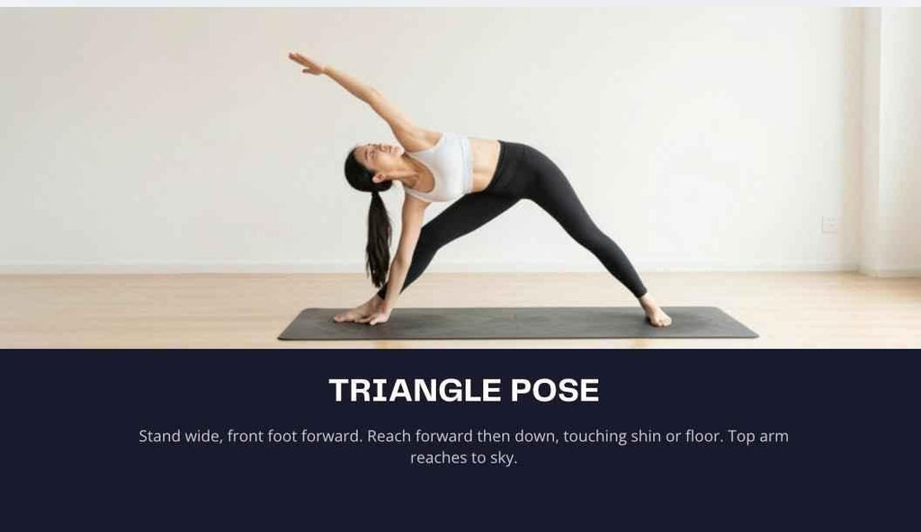 Person performing Triangle Pose on a yoga mat with a plain background